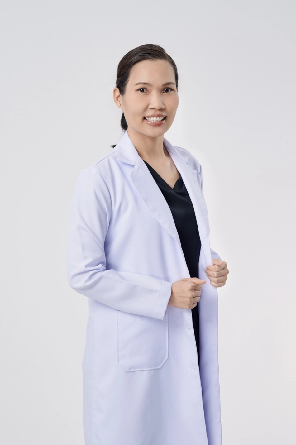 ทพญ. กนกอร ตันติพาณิชย์กุล smile and co dental clinic